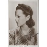 Dorothy Lamour Signed 5x3 vintage black and white photo. Good Condition. All autographs come with