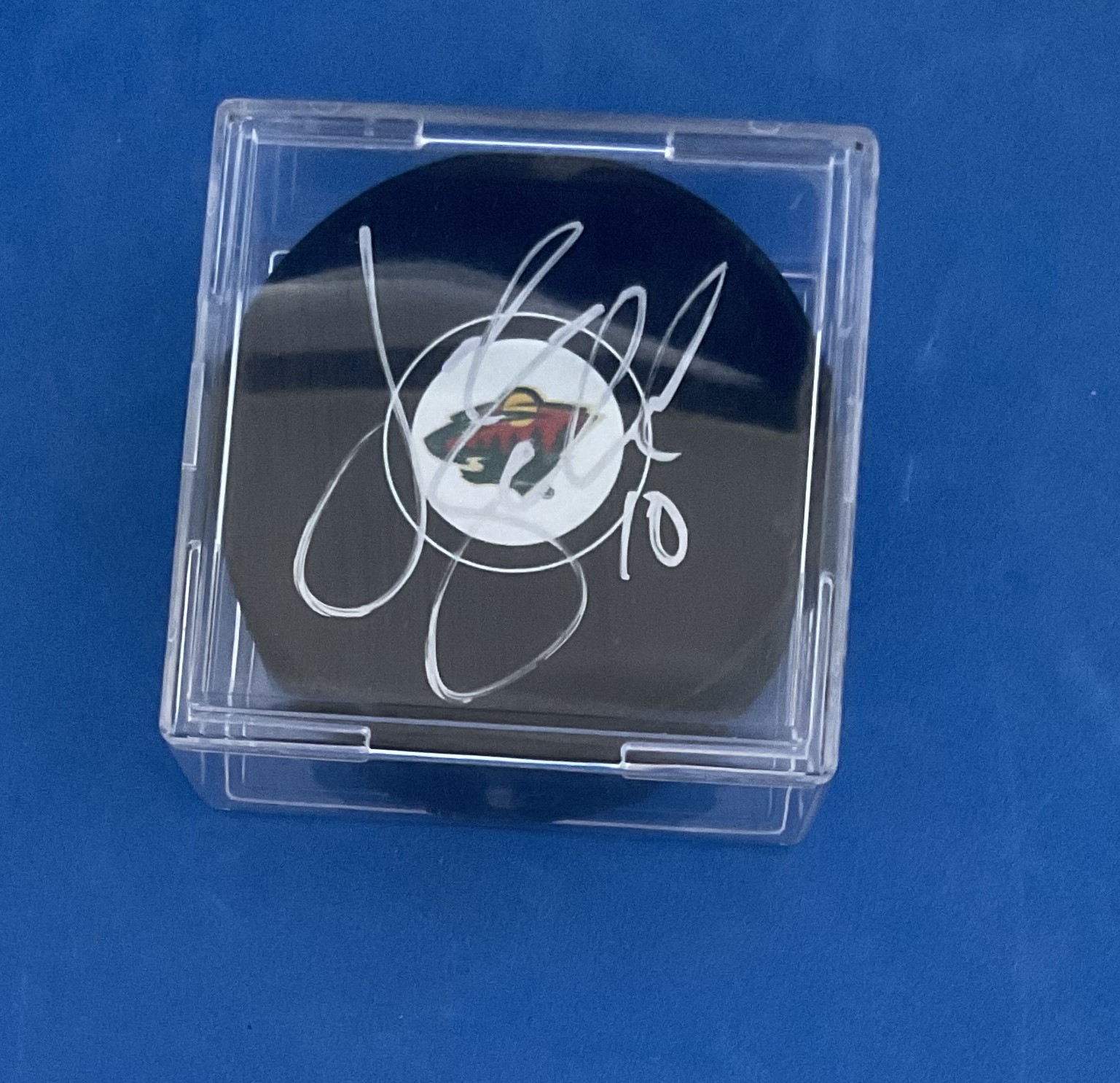 American Ice Hockey Player Jordan Schroeder Signed Official NHL Puck. Signed in silver ink. Housed - Image 2 of 2