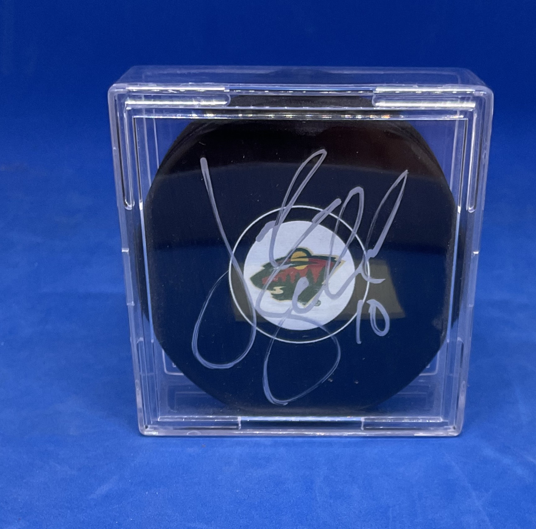 American Ice Hockey Player Jordan Schroeder Signed Official NHL Puck. Signed in silver ink. Housed