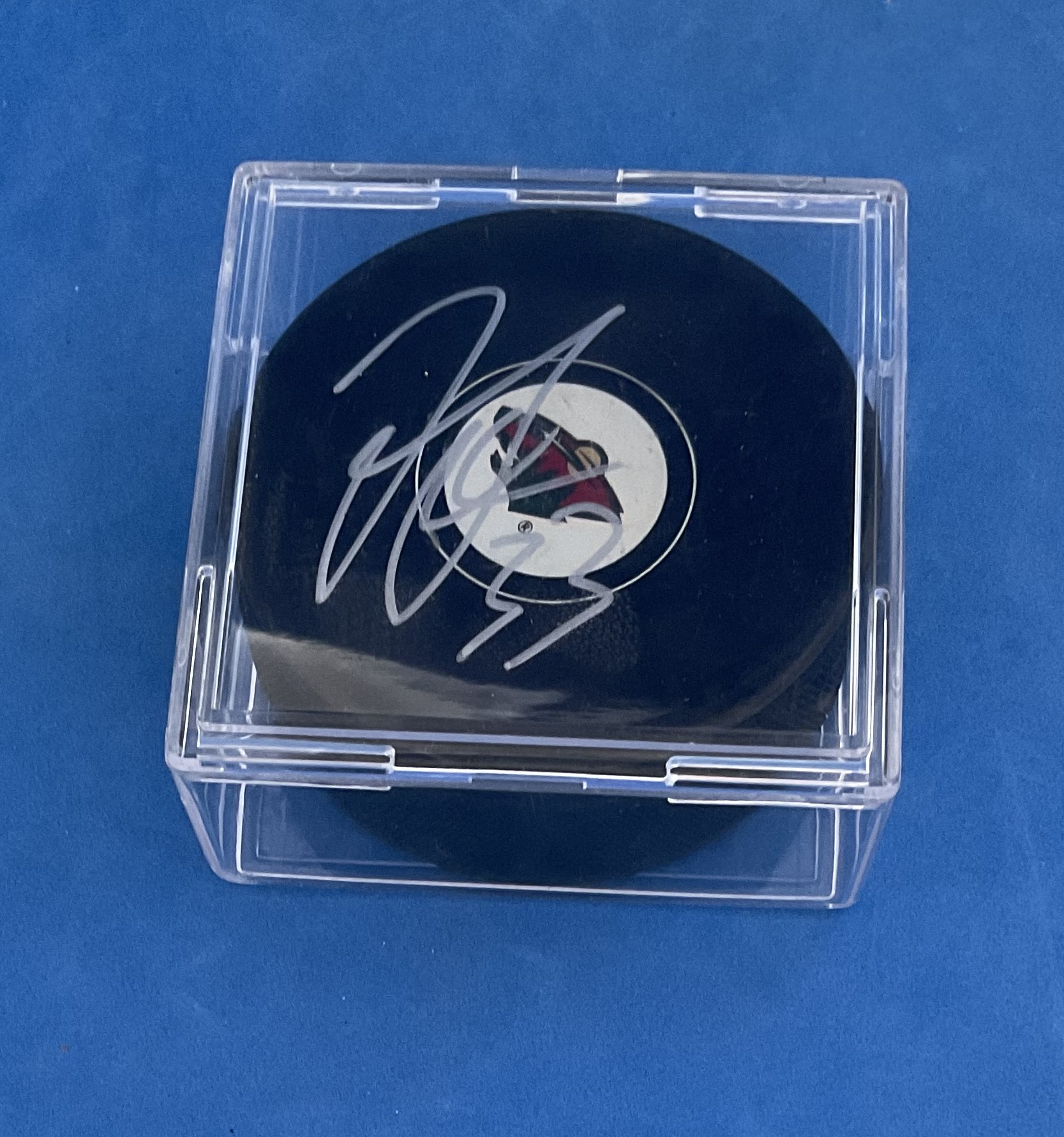 American Ice Hockey Defender Jordan Leopold Signed Official NHL Puck. Signed in silver ink. Housed - Image 2 of 2