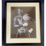 Evander Holyfield signed 20x16 mounted and framed black and white photo with an signed 16oz Red