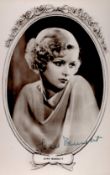 Joan Bennett Signed 5x3 inch approx black and white photo. Signed in blue ink. Good Condition. All