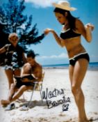 Martine Beswick signed 10 x 8 inch colour beach scene with Sean Connery. James Bond 007 Actress.