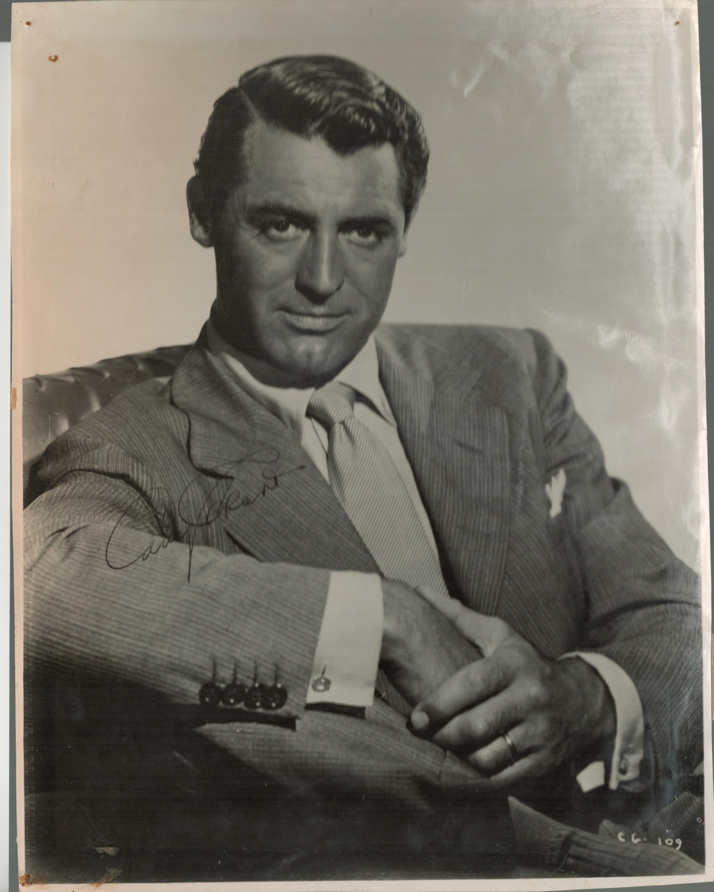 Cary Grant signed 10x8 black and white vintage photo. Good condition. All autographs come with a
