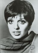 Liza Minnelli signed 7x5 black and white vintage photo. Good condition. All autographs come with a