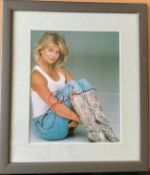 Goldie Hawn signed 15x13 overall framed and mounted colour photo. Good condition. All autographs