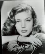 Lauren Bacall signed 10x8 black and white vintage photo. Good condition. All autographs come with