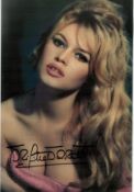 Brigitte Bardot signed 12x8 stunning colour photo. Good condition. All autographs come with a