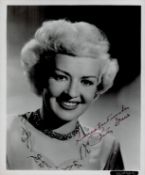 Betty Grable signed vintage 10x8 black and white photo. Good condition. All autographs come with a