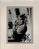 Yul Brynner signed 9x7 overall mounted black and white photo. Good condition. All autographs come