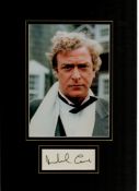 Michael Caine Actor Signed Card 10x15 Matted With Photo. Good condition. All autographs come with