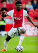 Football Mohammed Kudus signed Ajax 12x8 colour photo. Good Condition. All autographs come with a