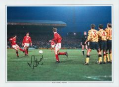 Football Mickey Thomas signed 16x12 colour print pictured scoring for Wrexham against Arsenal in the