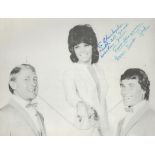 Trio Hoganas signed 9x7 black and white photo. Good condition. All autographs come with a