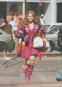 Australian Actress Isla Fisher Signed 10x8 inch Colour Photo From a Film. Signed in black ink.