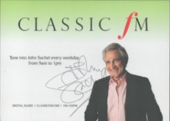 John Suchet signed Classic FM 6x4 colour promo photo. On the reverse is another signature to end a