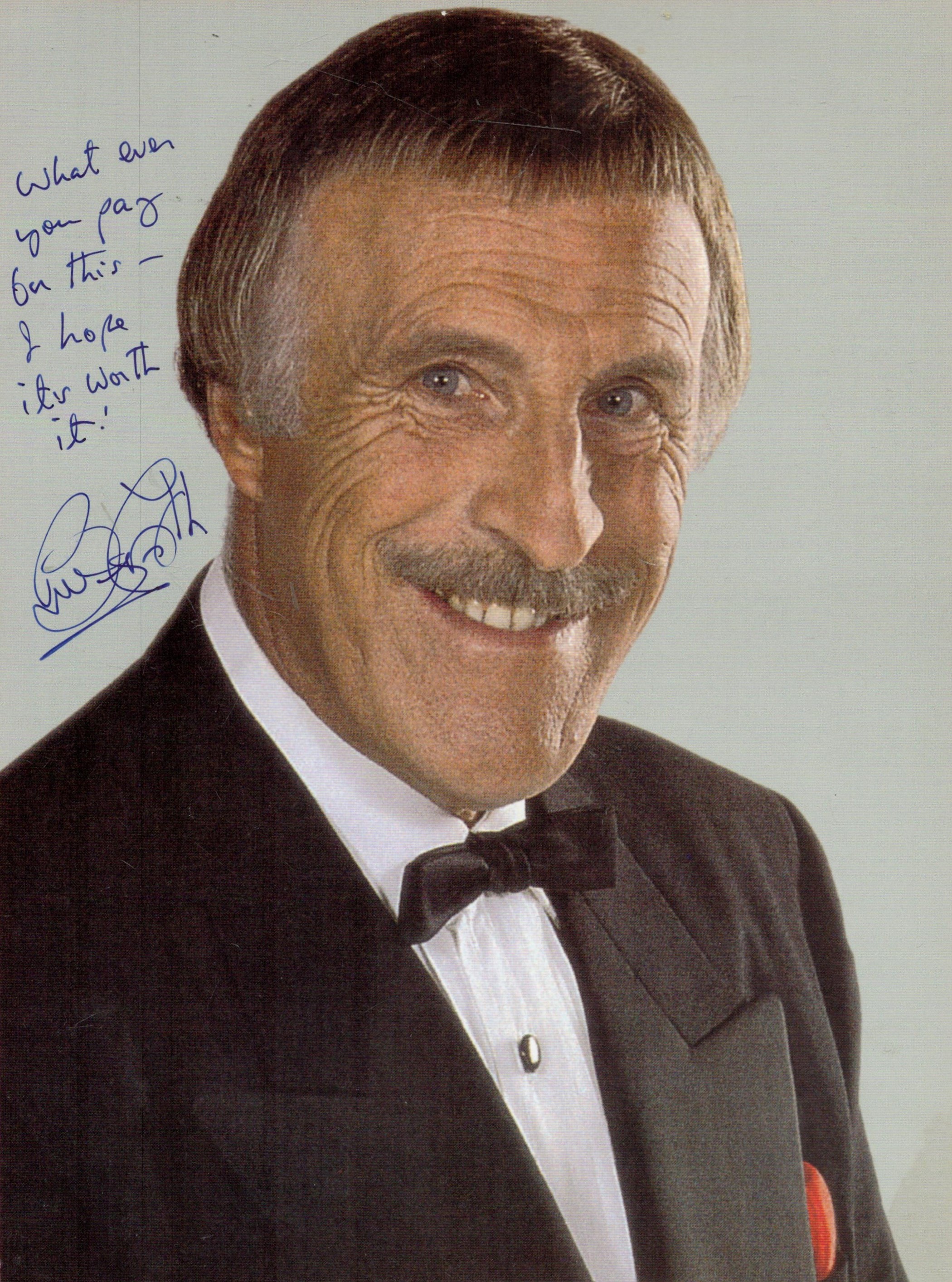 British TV Icon Bruce Forsyth Signed 10x8 inch Colour Photo with Humorous Inscription. Good