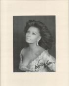Sophia Loren signed 14x11 mounted black and white photo. Good condition. All autographs come with