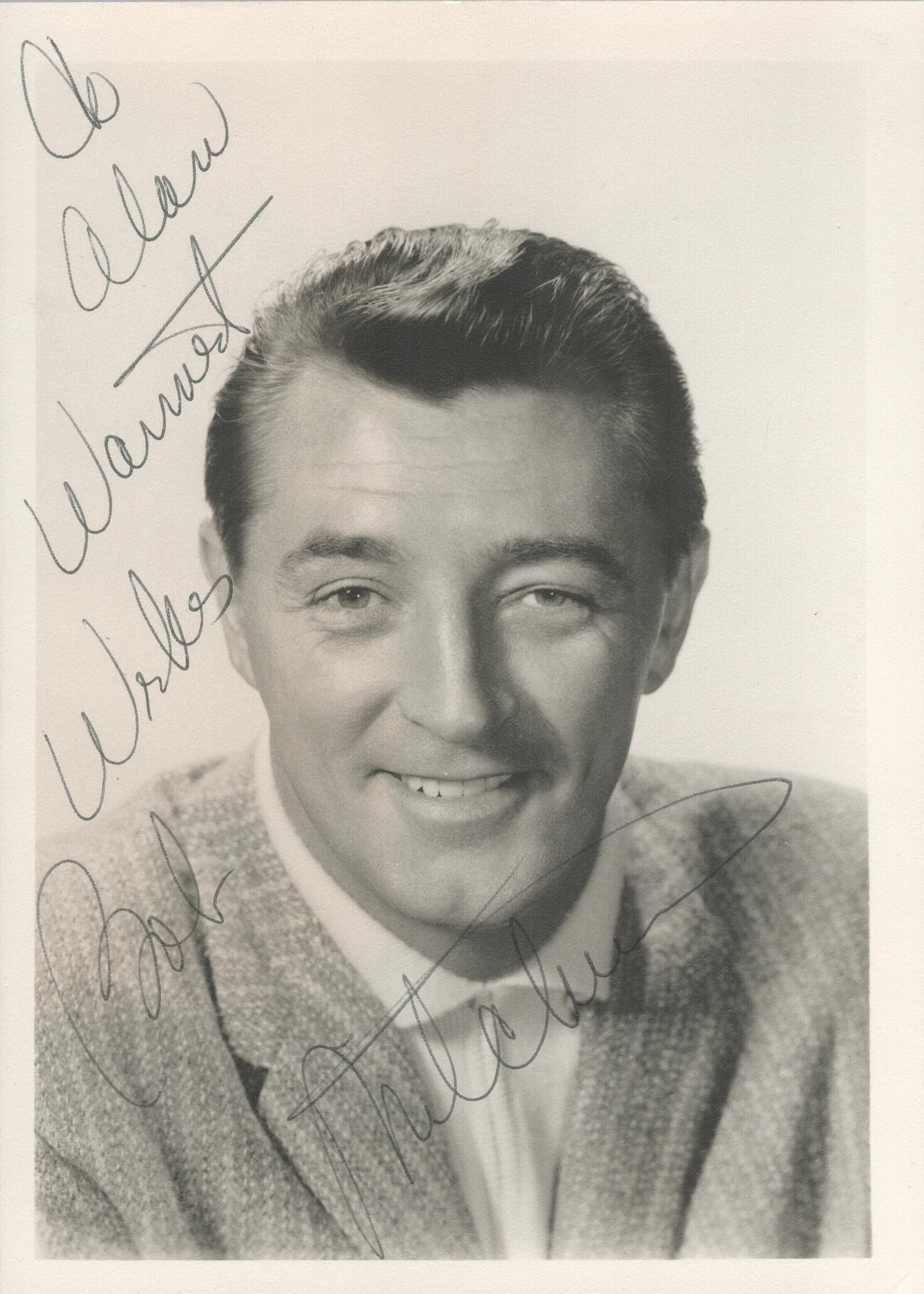 Robert Mitchum signed 7x5 black and white vintage photo dedicated. Good condition. All autographs