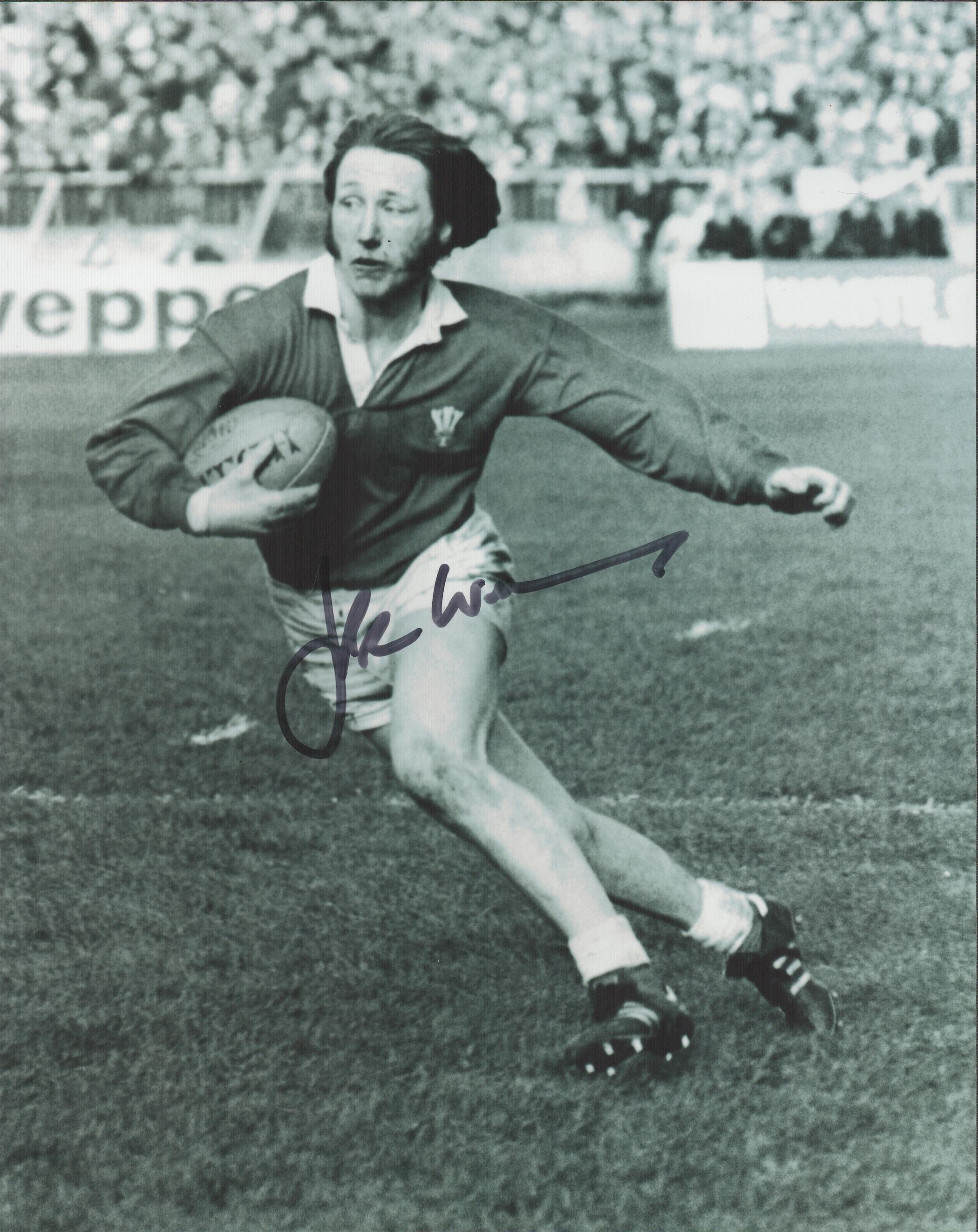 J. P. R Williams signed 10x8 black and white photo. Williams MBE FRCS is a former Welsh rugby