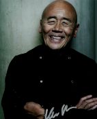 Ken Hom signed 10x8 colour photo. Chef. Good condition. All autographs come with a Certificate of