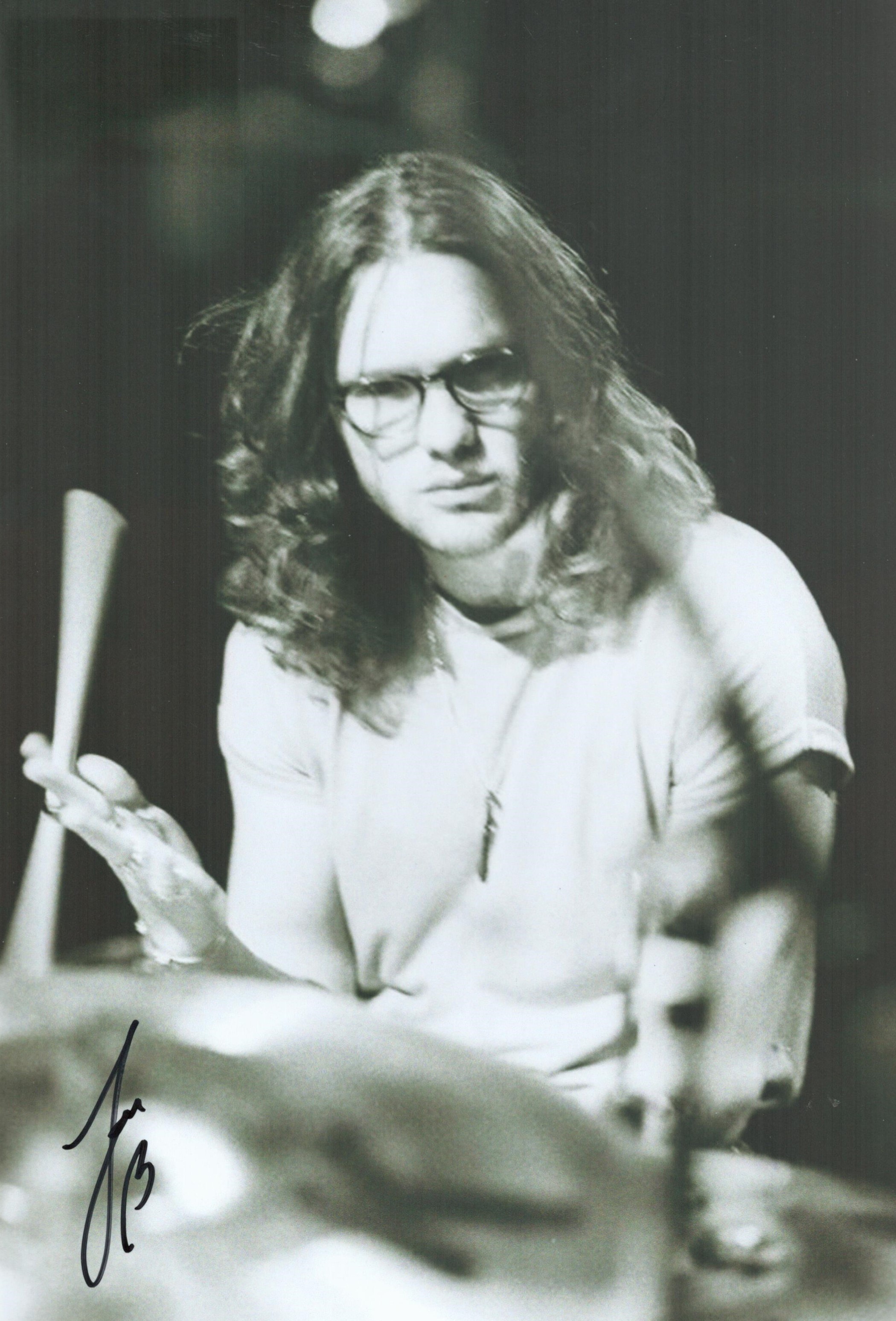 Joe Donovan signed 12x8 black and white photo. Drummer. Good condition. All autographs come with a