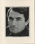 Gregory Peck signed 14x11 overall mounted black and white photo. Good condition. All autographs come