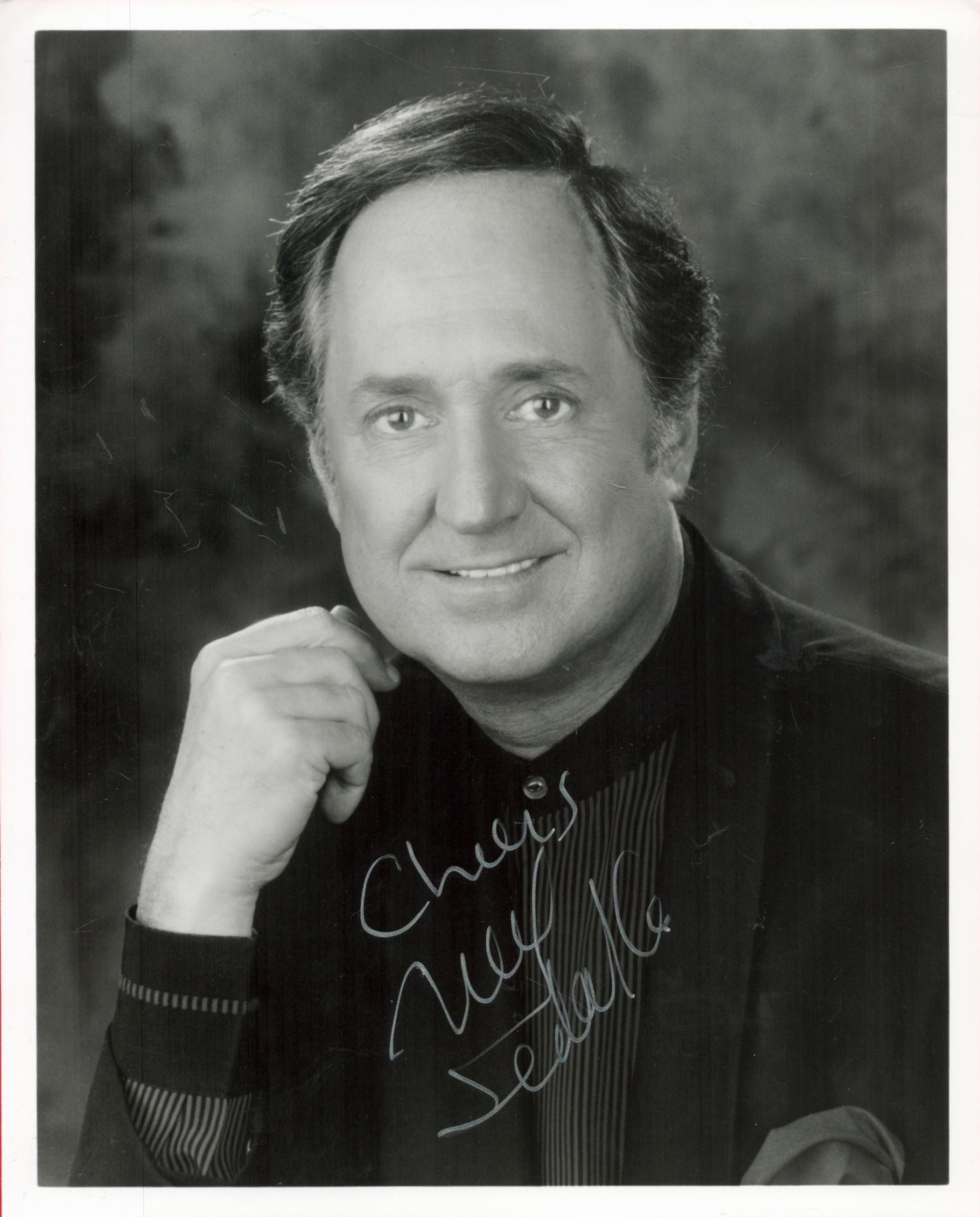 American Singer Neil Sedaka Signed 10x8 inch Black and White Photo. Good condition. All autographs