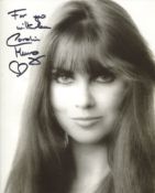 8 Bond actress Caroline Munro signed sexy pose 8x10 photo. Good Condition. All autographs come