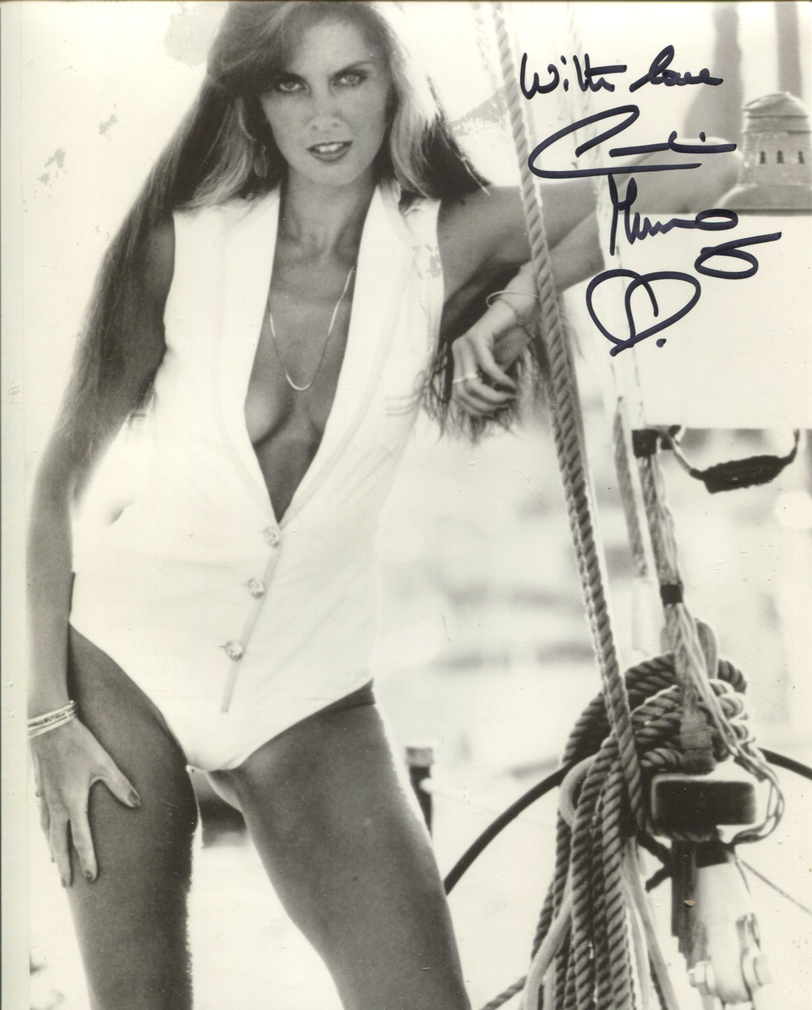 007 Bond actress Caroline Munro signed sexy pose 8x10 photo. Good Condition. All autographs come