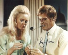 Roger Moore signed 8x10 photo from the TV series 'The Saint'. Good Condition. All autographs come