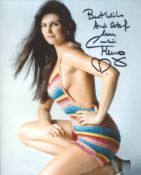 007 Bond actress Caroline Munro signed sexy pose 8x10 photo. Good Condition. All autographs come