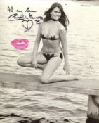 007 James Bond actress Caroline Munro signed and kissed sexy 8x10 bikini photo! She has actually