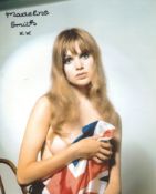 007 Bond girl Madeline Smith signed sexy busty pose 8x10 photo. Good Condition. All autographs