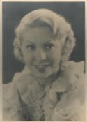 June Clyde signed 7x5 sepia photo. Good Condition. All autographs come with a Certificate of