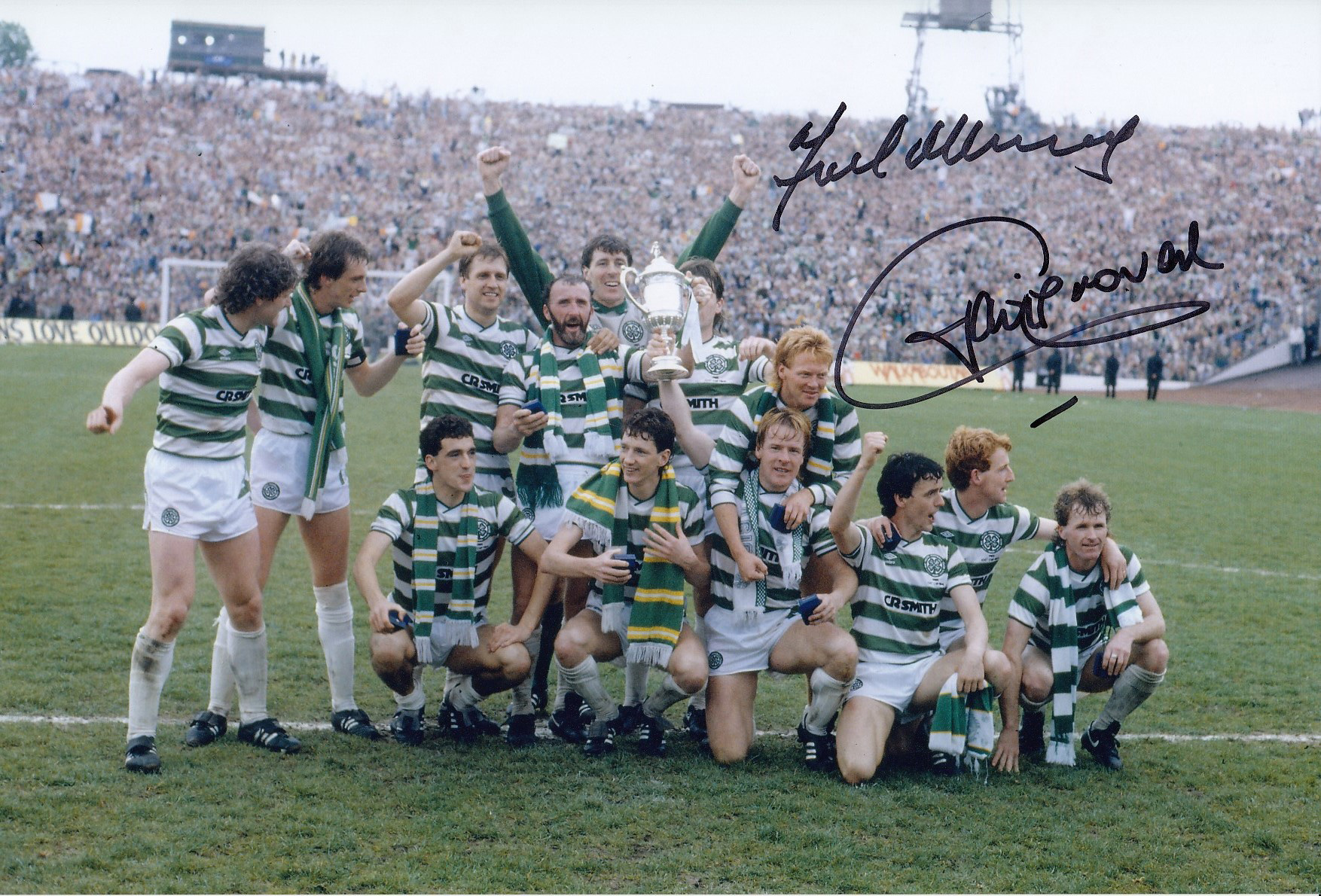 Autographed CELTIC 12 x 8 photo : Col, depicting Celtic players celebrating with the Scottish Cup in