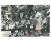 The Wizard of Oz 8x10 movie scene photo signed by Munchkin actor Jerry Maren. Good Condition. All