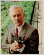 Edward Woodward signed 10x8 colour photo. Dedicated. Good Condition. All autographs come with a