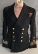 WW2 Original Navy Commanding Officers Blue Navy Jacket with Buttons and Military Award Badges.