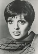Liza Minnelli signed 7x5 black and white photo. Good condition. All autographs come with a