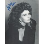 Sophia Loren signed 10x7 vintage black and white photo. Good condition. All autographs come with a