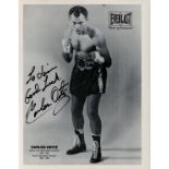 Carlos Ortiz signed Everlast 10x8 vintage black and white promo photo. Dedicated. Good condition.