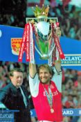 Tony Adams signed 12x8 colour photo with premiership trophy. Good condition. All autographs come
