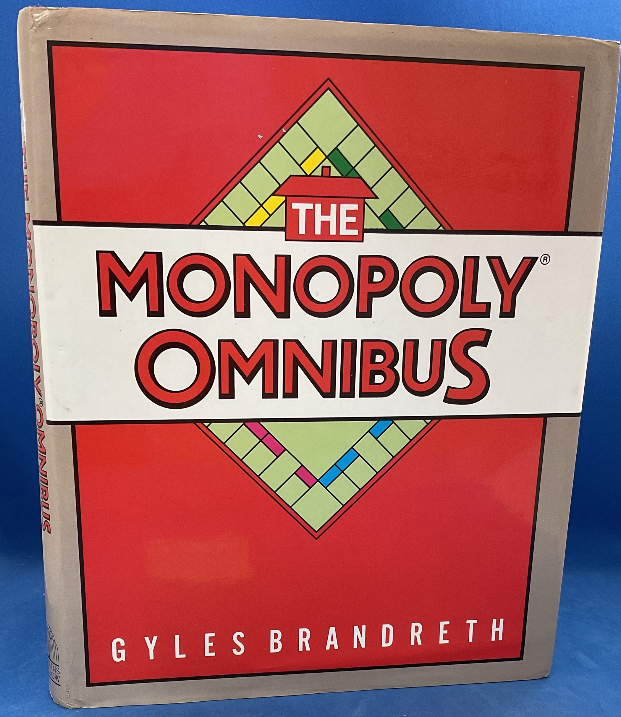 The Monopoly Omnibus 1st Edition Hardback Book by Gyles Brandreth. Published in 1985. 224 Pages.