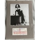 Ava Gardner signed cheque mounted with b/w photo. Good condition. All autographs come with a