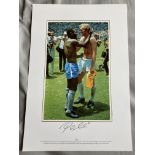 Football legend Pele signed 16 x 12 inch colour photo with Bobby Moore. Good condition. All