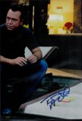 Tom Arnold Signed 12x8 inch Colour Photo. Signed in blue ink. Good condition. All autographs come