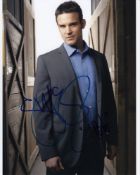 Blowout Sale! Warehouse 13 Eddie McClintock hand signed 10x8 photo. This beautiful 10x8 hand