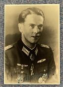 WW2 Gunter Hochgartz KC Signed 6x4 inch Black and White photo. Signed in blue ink. Good condition.