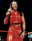 Wrestling Star Jacqueline Moore Signed 10x8 inch Colour WWF Photo. Signed in blue ink. Good
